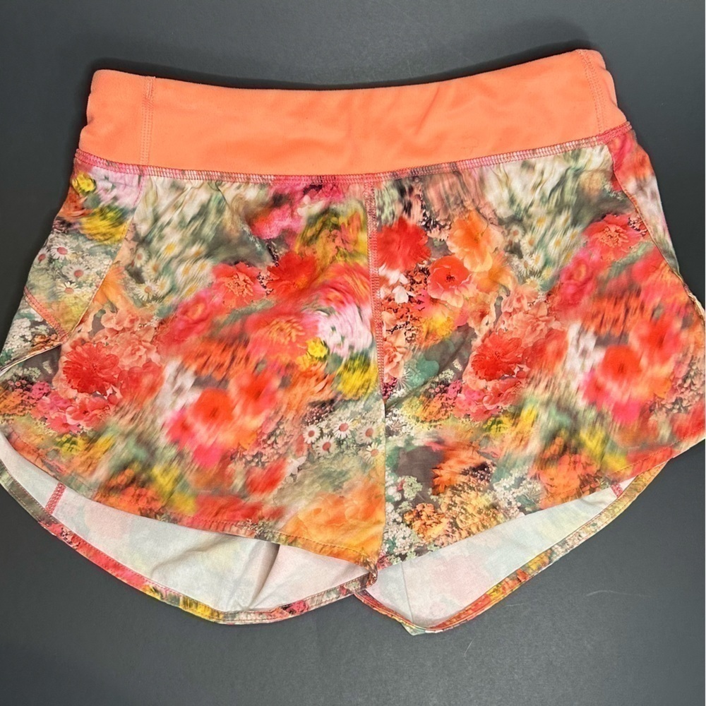 Athleta Girl Size Large 12 Run the World Short Coral Pink Blurred Floral 3”